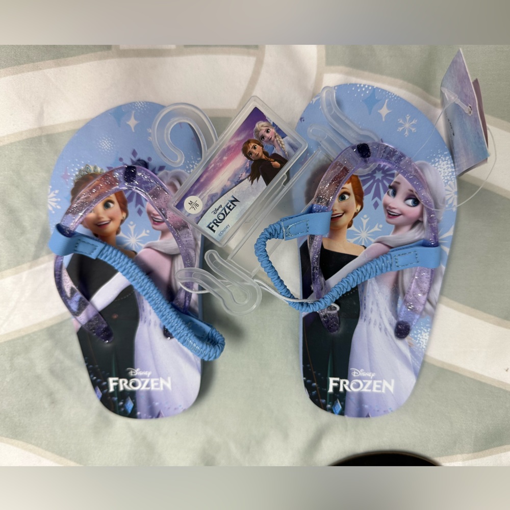 Girls Frozen Flip Flops. New with tags.